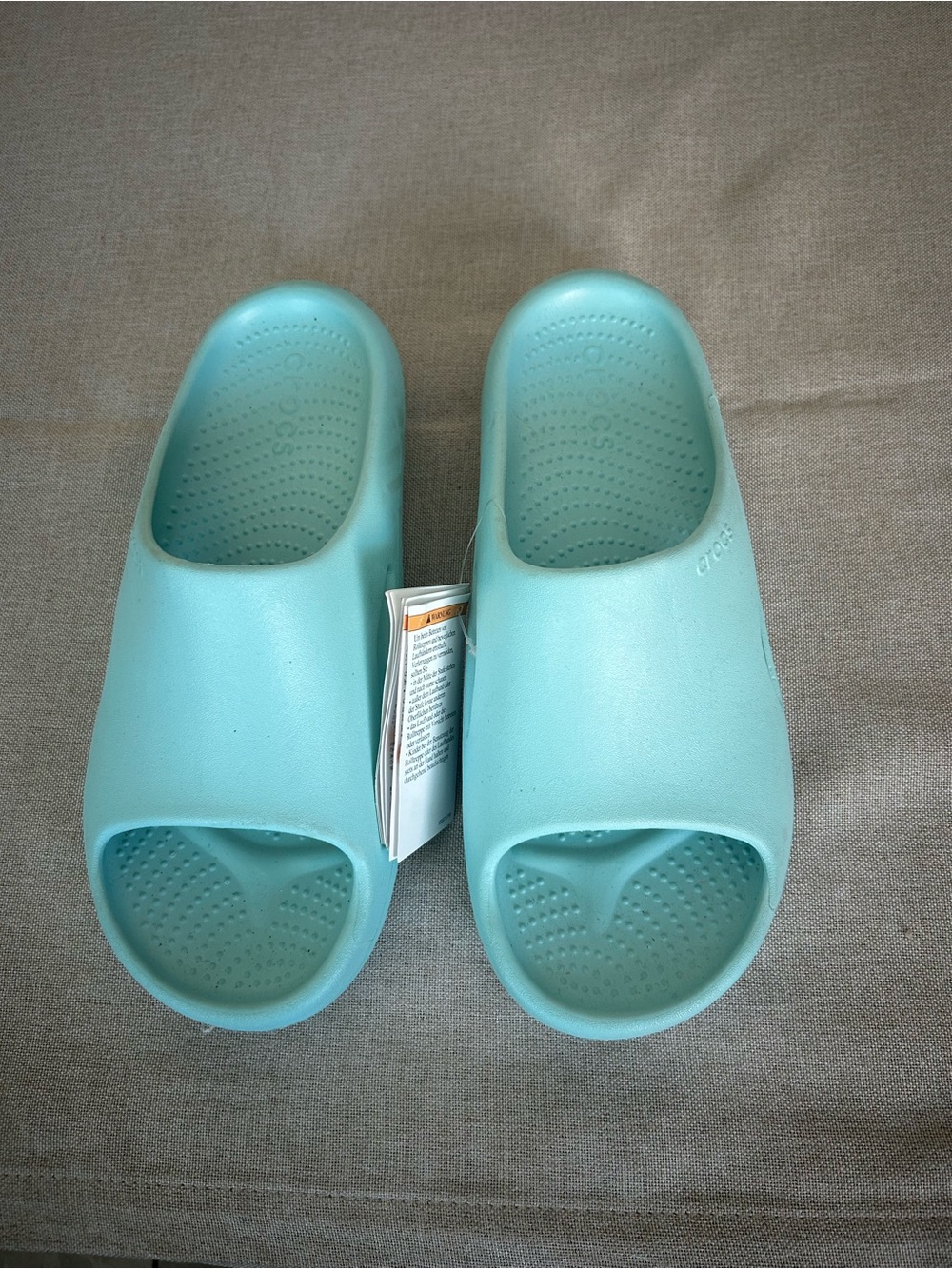 CROCS Women's Slide Sandals in Light Aqua